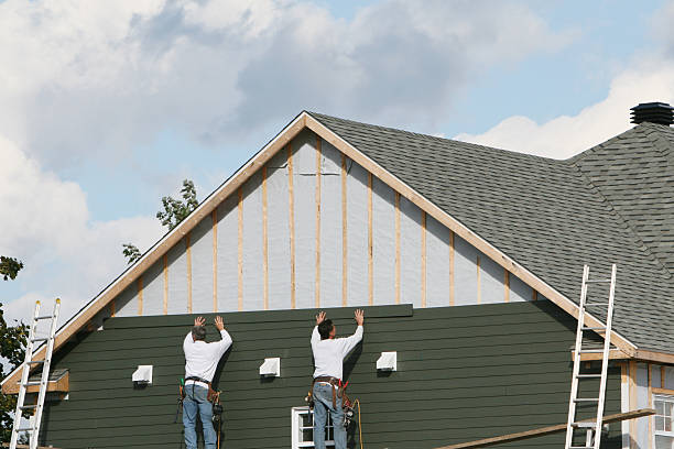 Professional Siding technician working in North Lawrence, OH